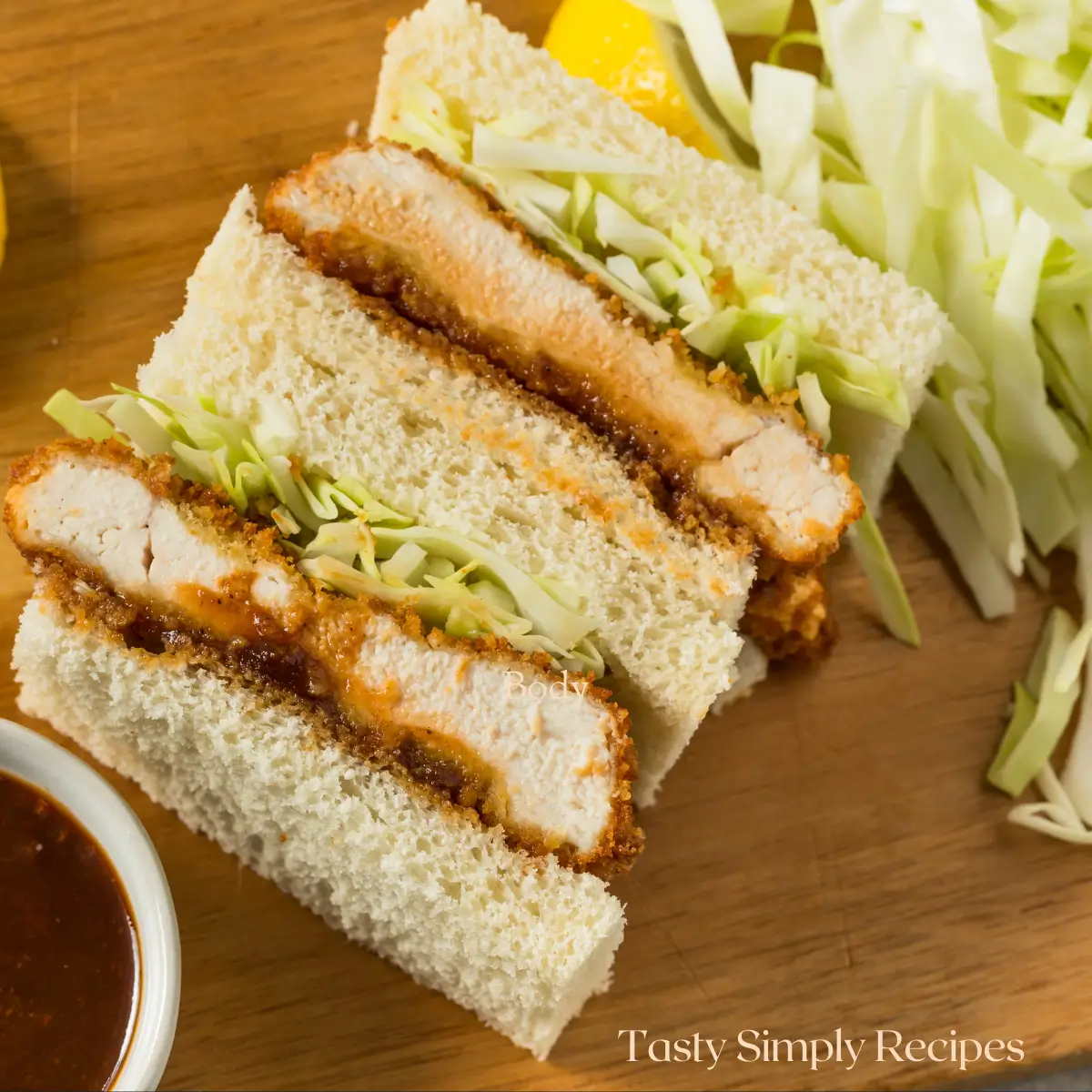 Chicken Katsu Sando – A Crispy, Soulful Bite Inspired by Japan 7 Chicken Katsu Sando sandwich with crispy chicken cutlet, shredded cabbage, and tonkatsu sauce on soft Japanese milk bread